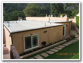 Flat Roof and Gutter System