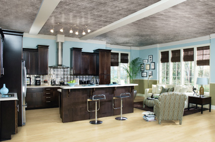 Armstrong provides multiple options for kitchen remodels, including inspirational products for ceilings, backsplashes and wainscoting applications. Designed from the top down, the kitchen above includes Armstrong&rsquo;s Tin Look&trade; mineral fiberboard panels painted in silver on the ceiling; a Metallaire&trade; decorative metal backsplash in stainless steel and painted WoodHaven&reg; laminate planks as a wainscoting
