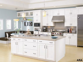 A watery blue wall paint in the kitchen is a timeless trend that goes well with any color cabinetry, such as American Woodmark&rsquo;s Del Ray collection in White Thermo Foil.